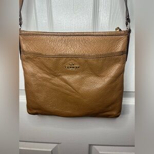 Camel-colored Coach
Crossbody Bag  Tan Leather Crossbody Bag